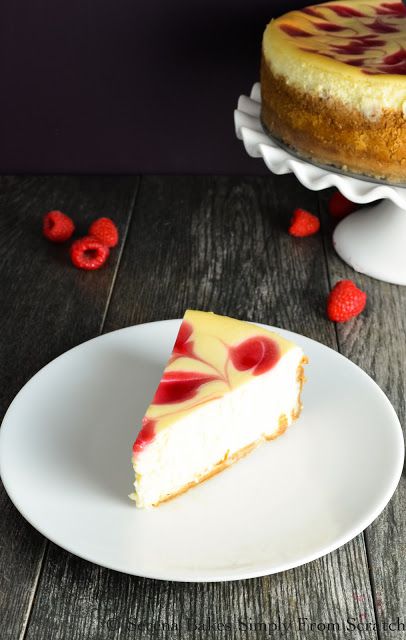Tall and creamy cheesecake with raspberry swirl