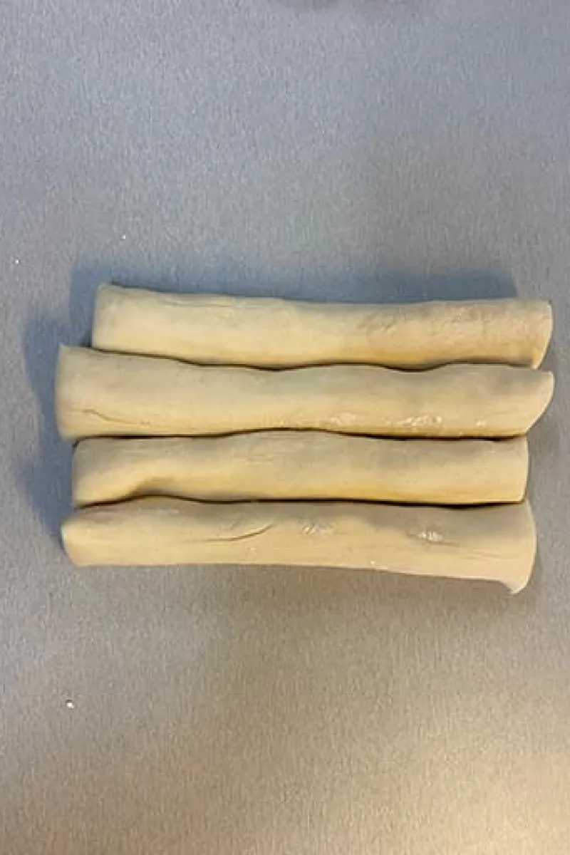 Dividing the gyoza dough into equal pieces