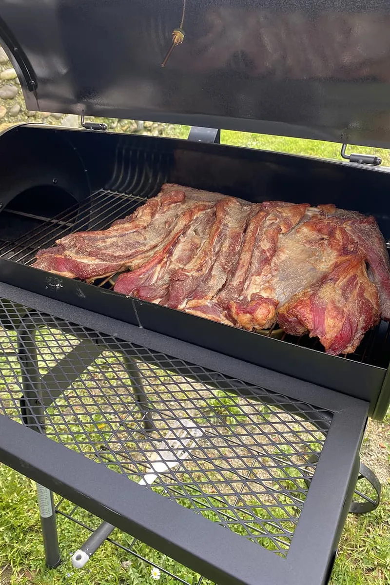 The brisket after 4 hours of being smoked
