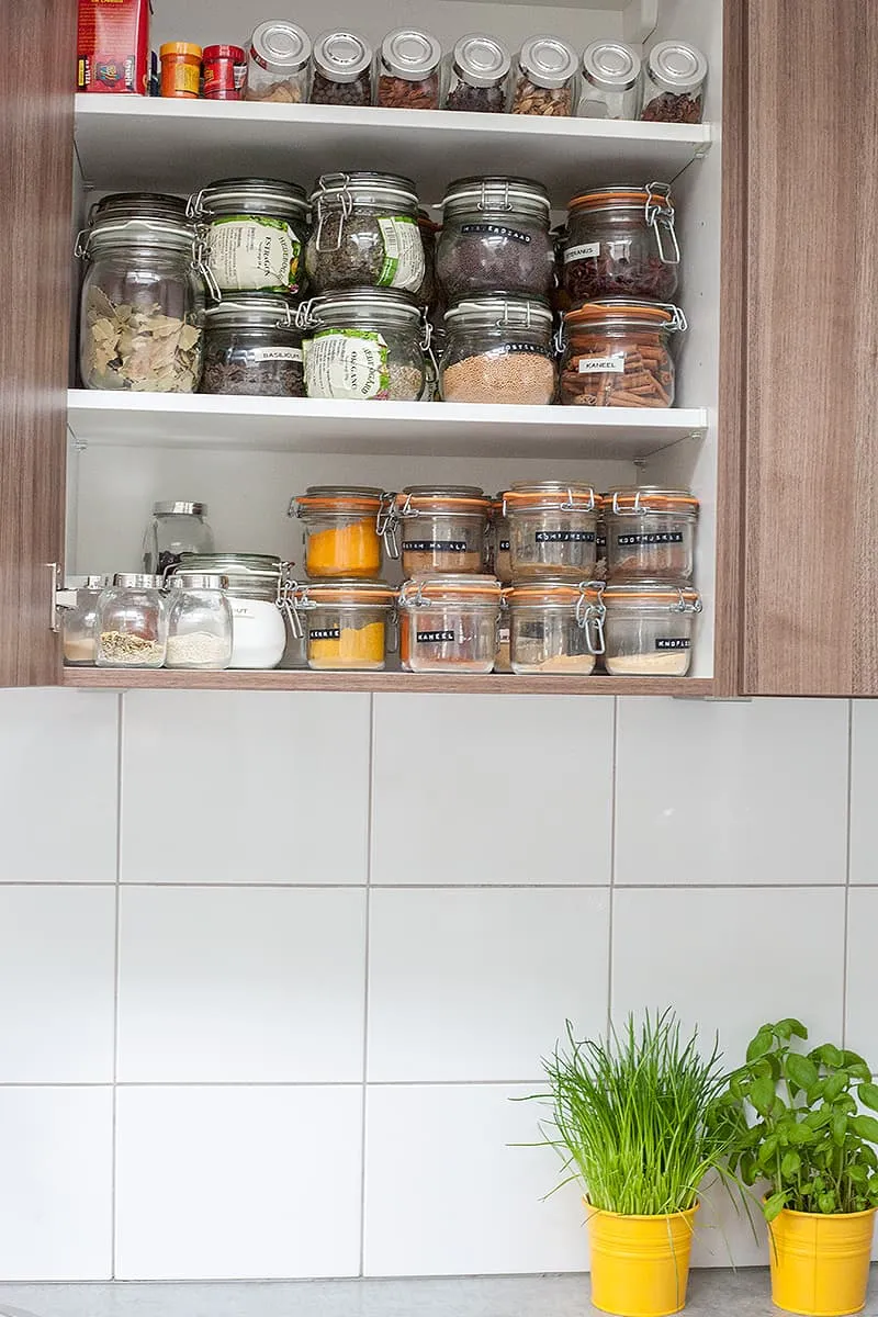 Cupboard full of spice jars