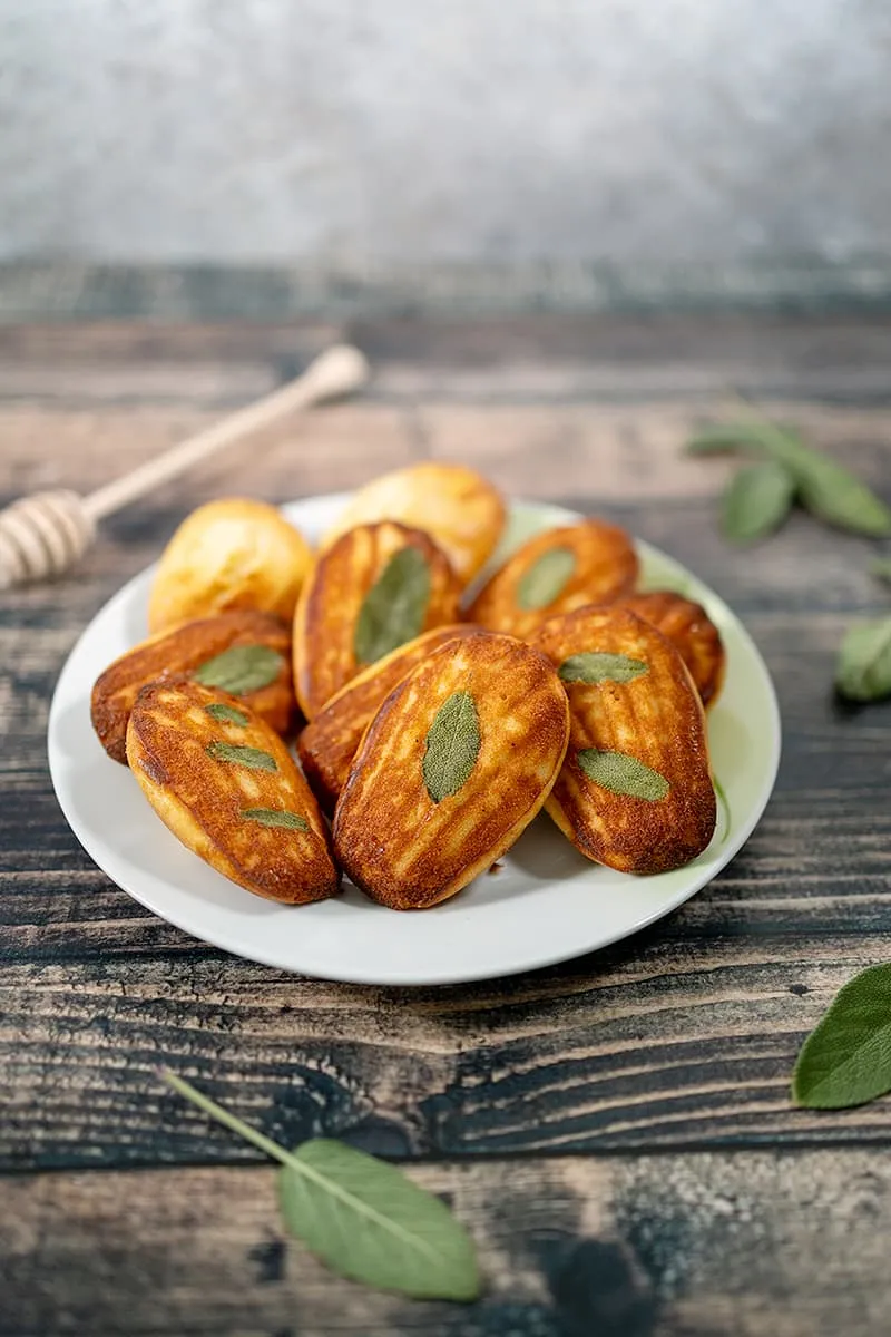 Savory madeleines with goat cheese, honey and sage