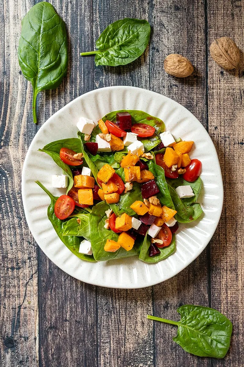 Spinach and sweet potato salad – served with red beets and feta