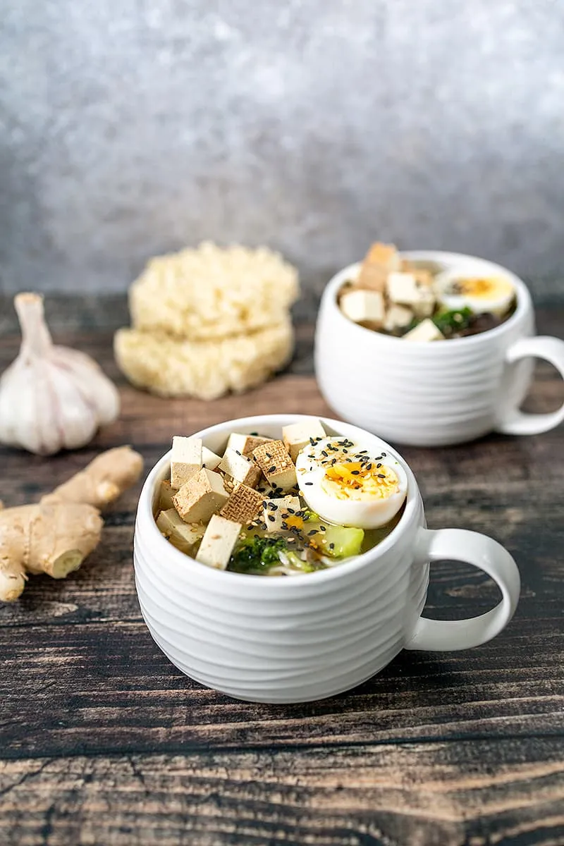 Tofu noodle soup with mushrooms and broccoli