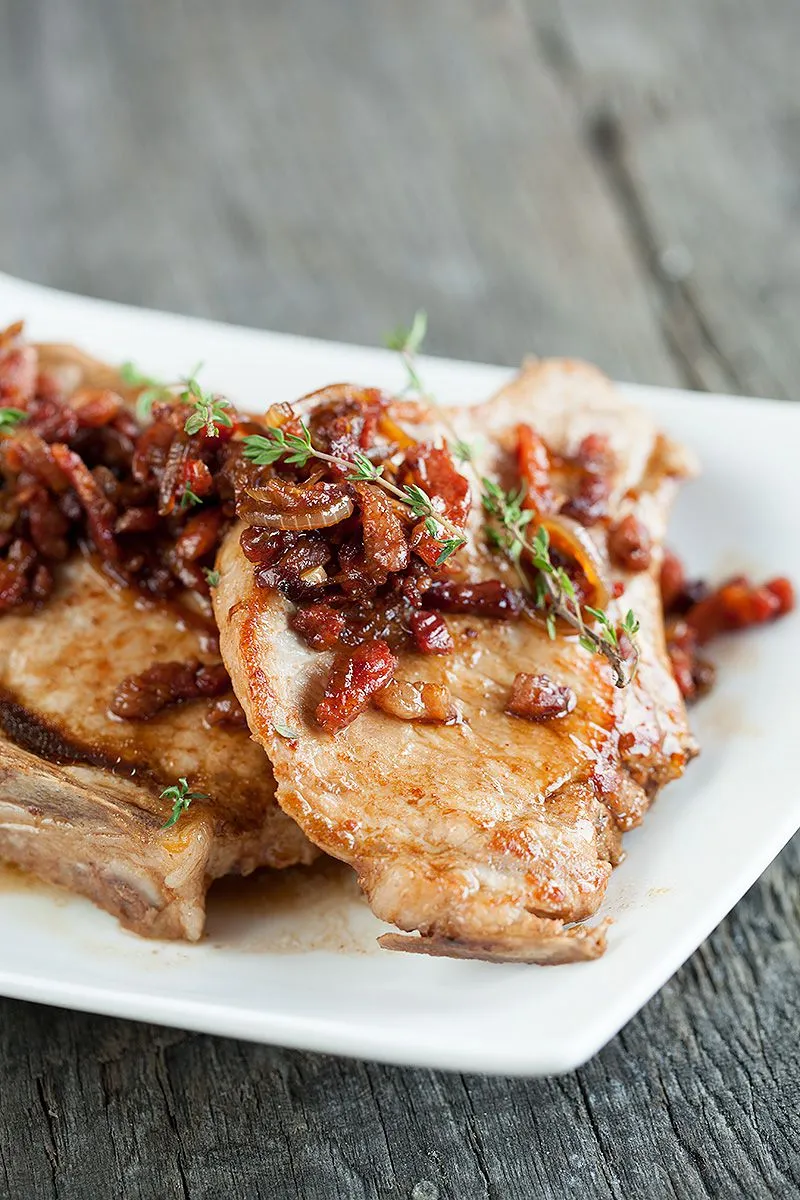 Pork chops with bacon and caramelised onions