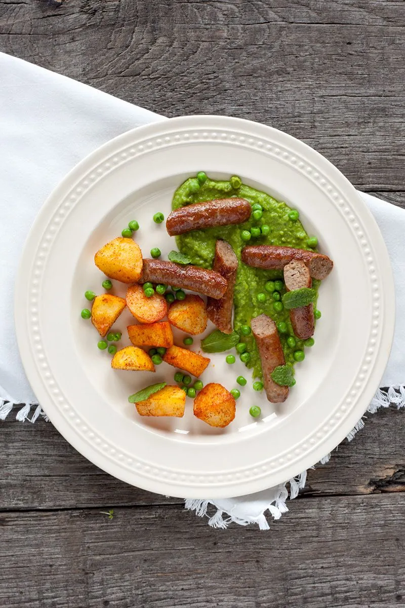 Lamb sausages with minted pea puree