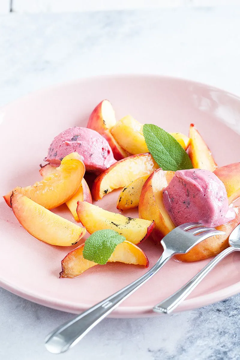 Sage ice cream with oven-roasted peaches