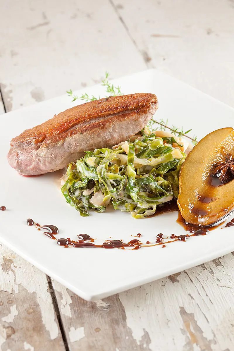 Pan-fried duck breast with creamed cabbage
