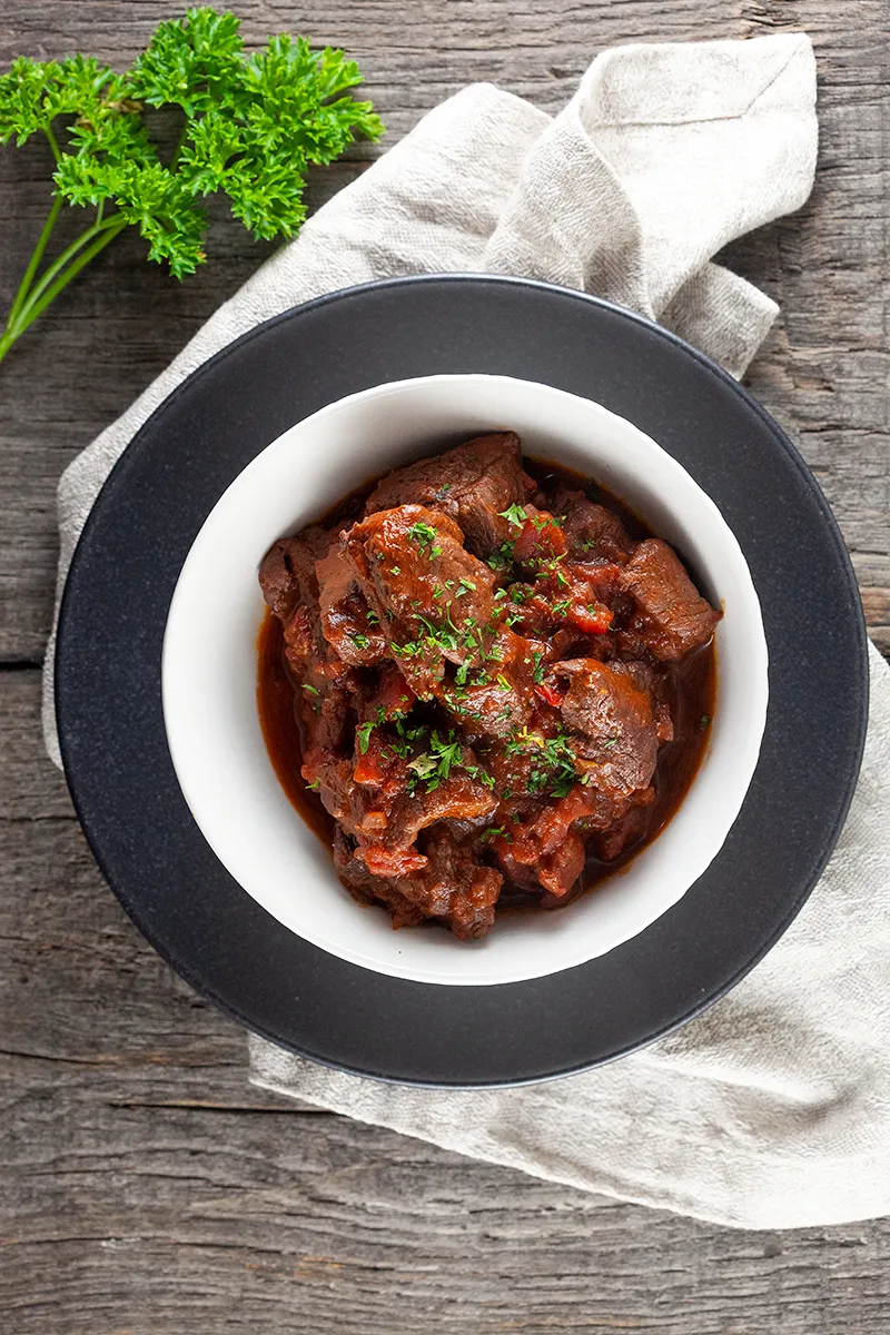 Beef sirloin in red wine sauce casserole