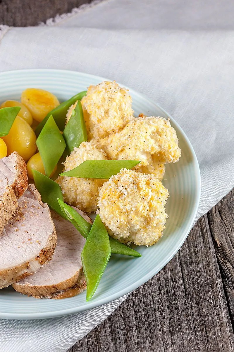 Pork roulade with baked cauliflower and baby potatoes