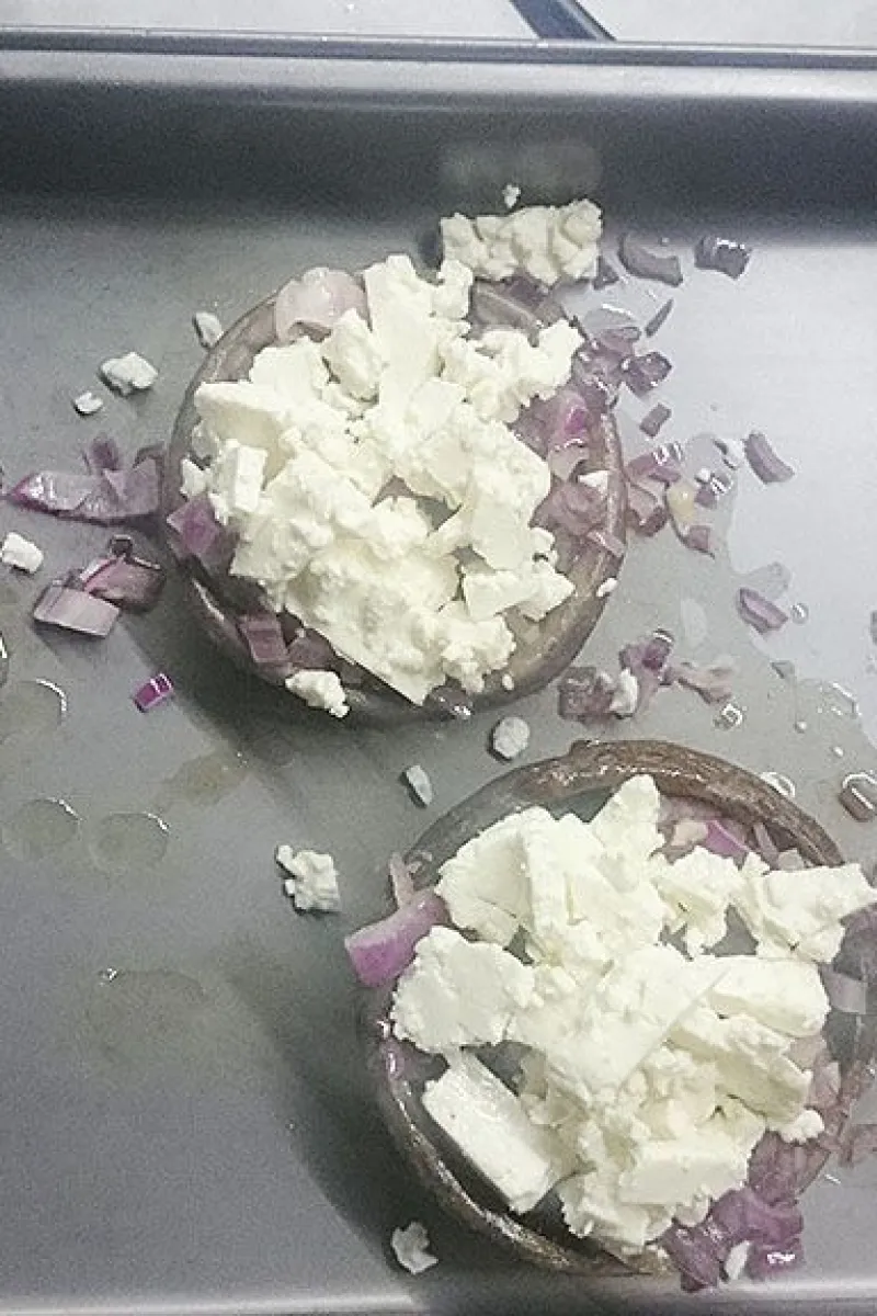 Stuffed mushrooms on baking tray