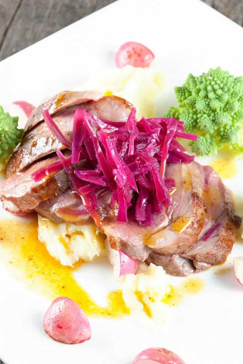 Juicy duck breast and romanesco