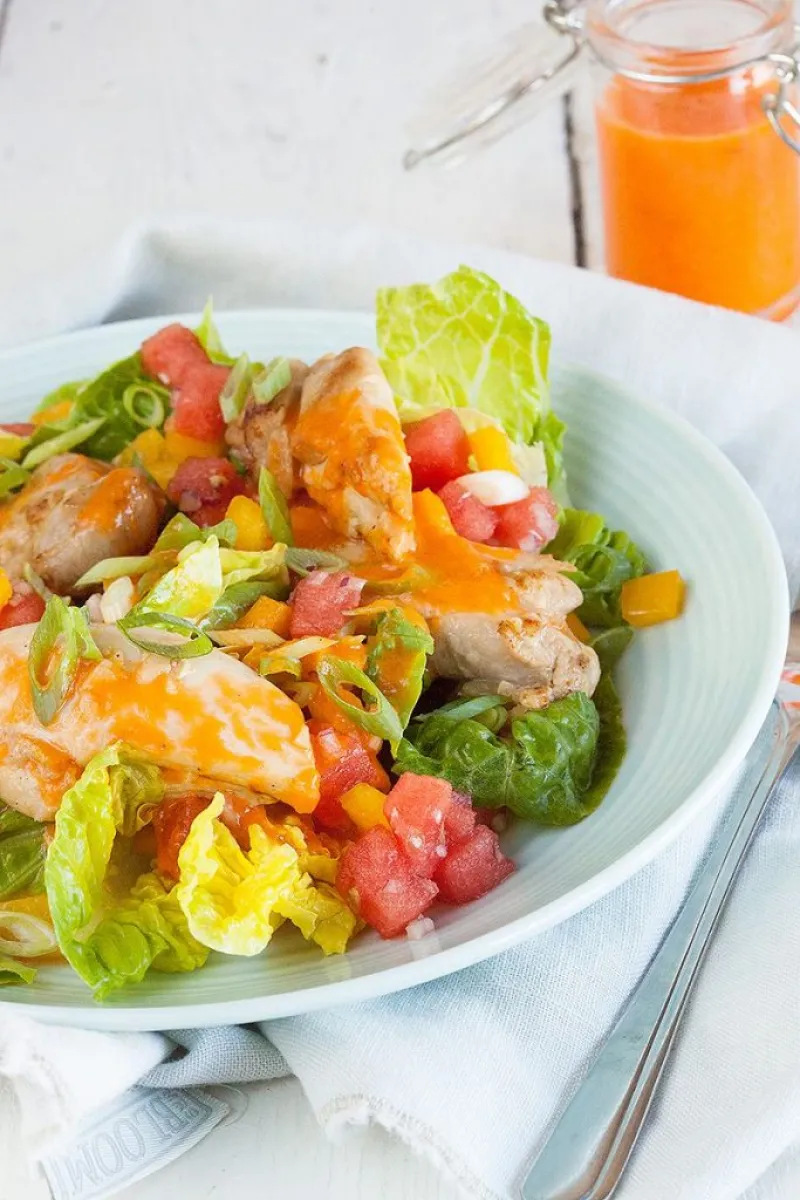 Salad with marinated chicken thighs and watermelon