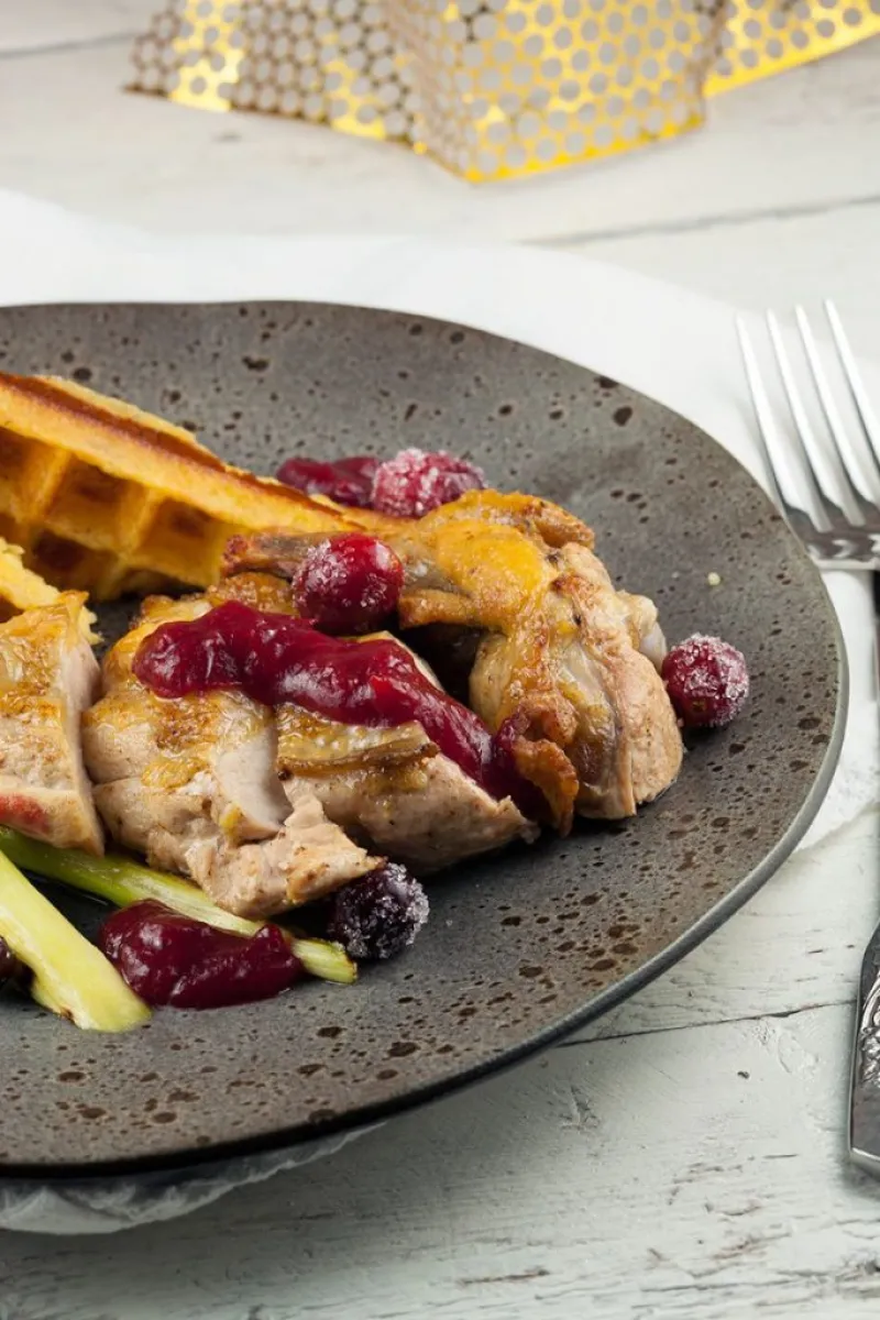 Guinea fowl with cranberries and potato waffles