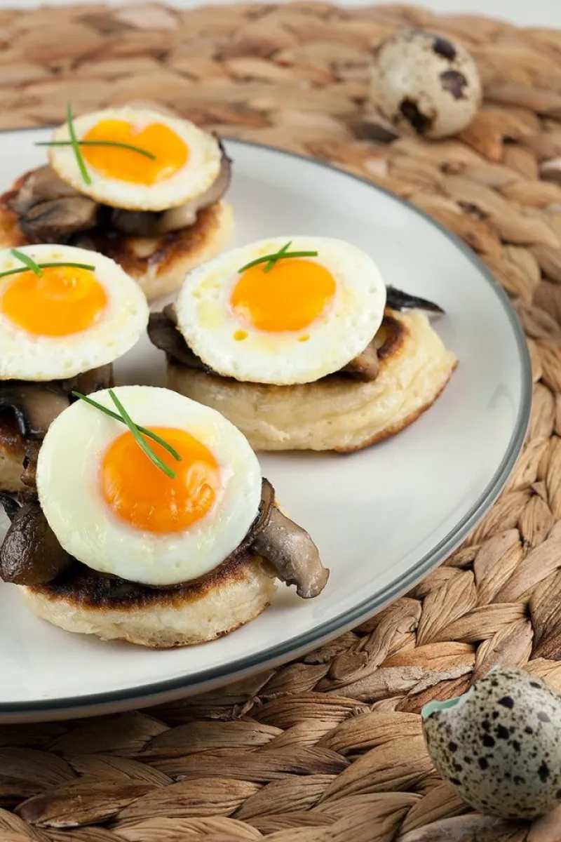 Blini's with chestnut mushrooms and quail eggs