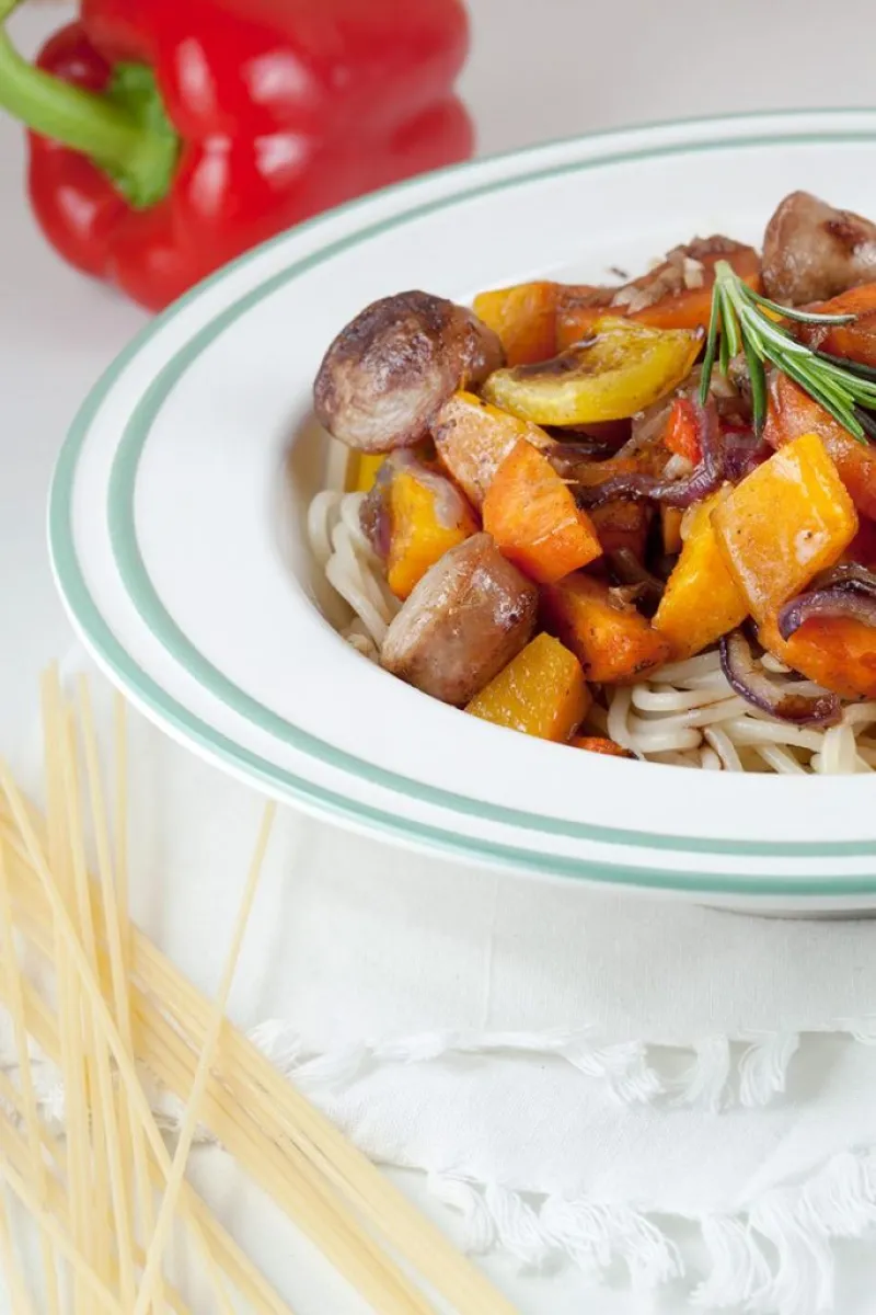 Pasta with oven-baked vegetables and sausage