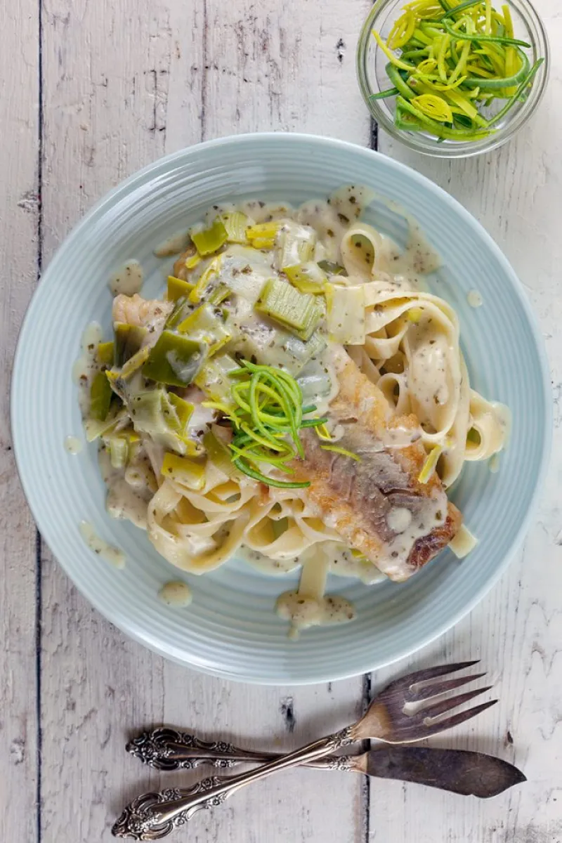Tagliatelle with creamy pesto leeks and cod