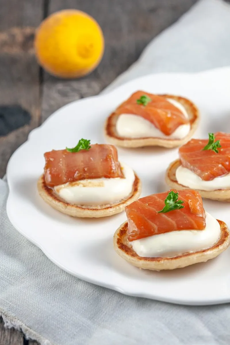 Salmon and yuzu blinis