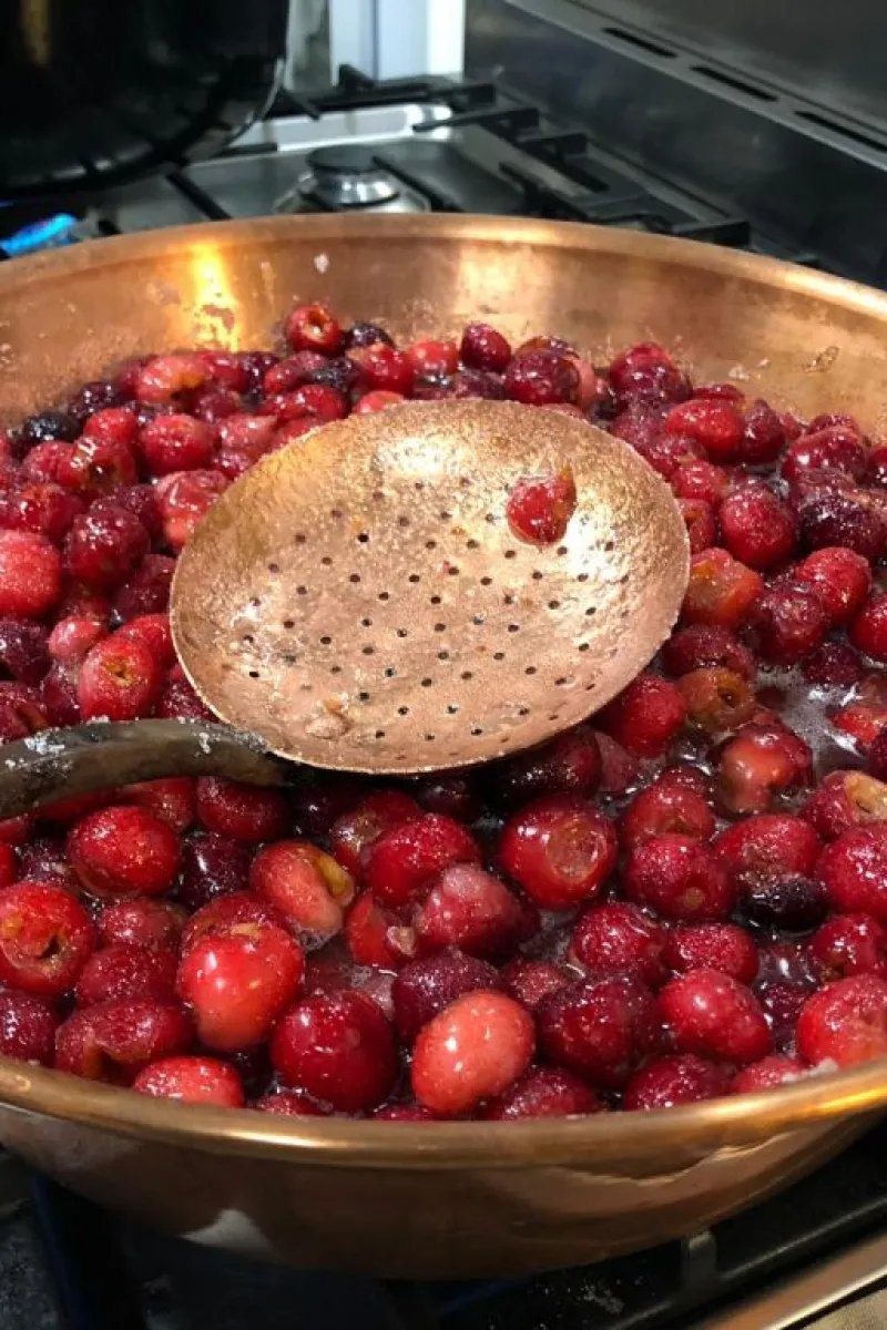 Making cherry jam