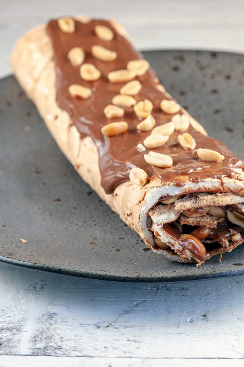 Peanut and chocolate meringue roll