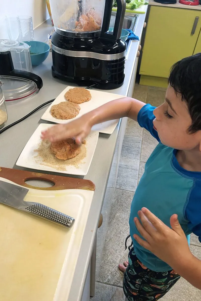 Sous chef Bram creating salmon burgers