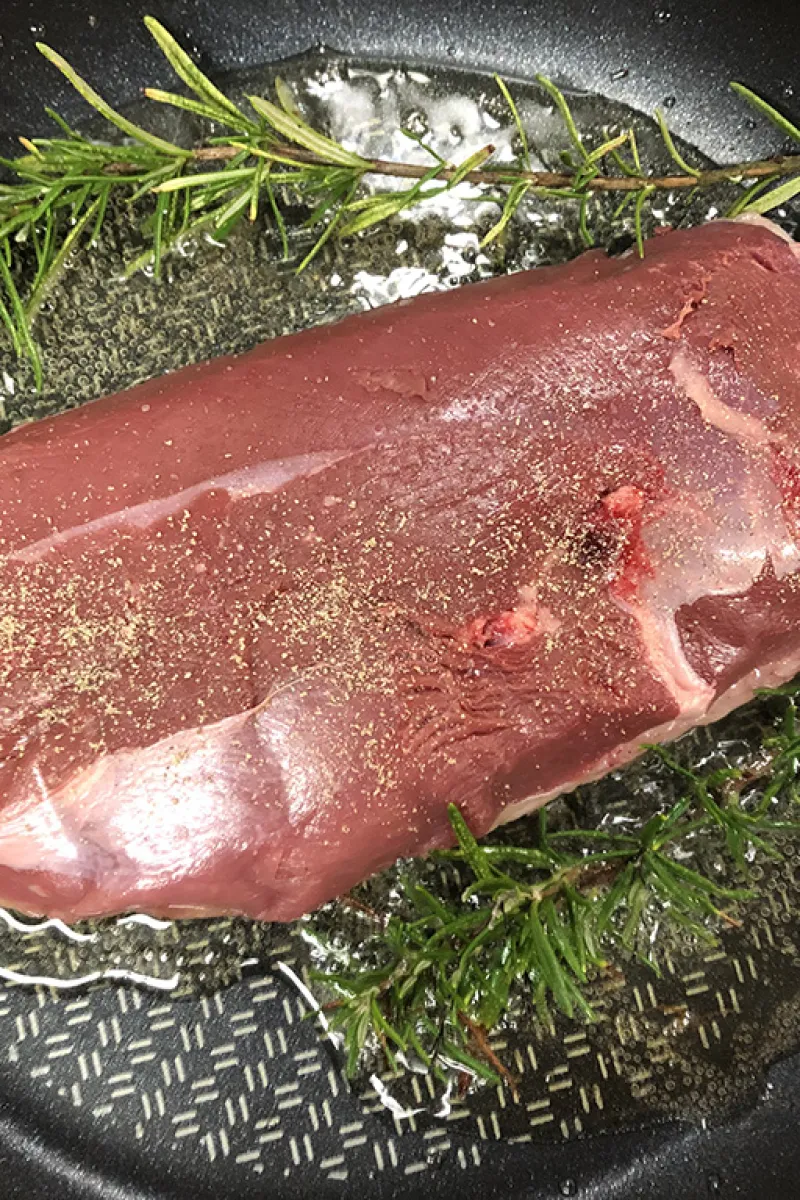 Fresh herbs are used to cook the duck breast