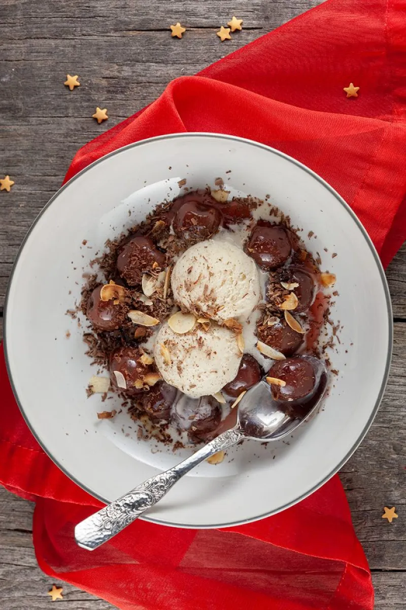 Warm cherries with vanilla ice cream