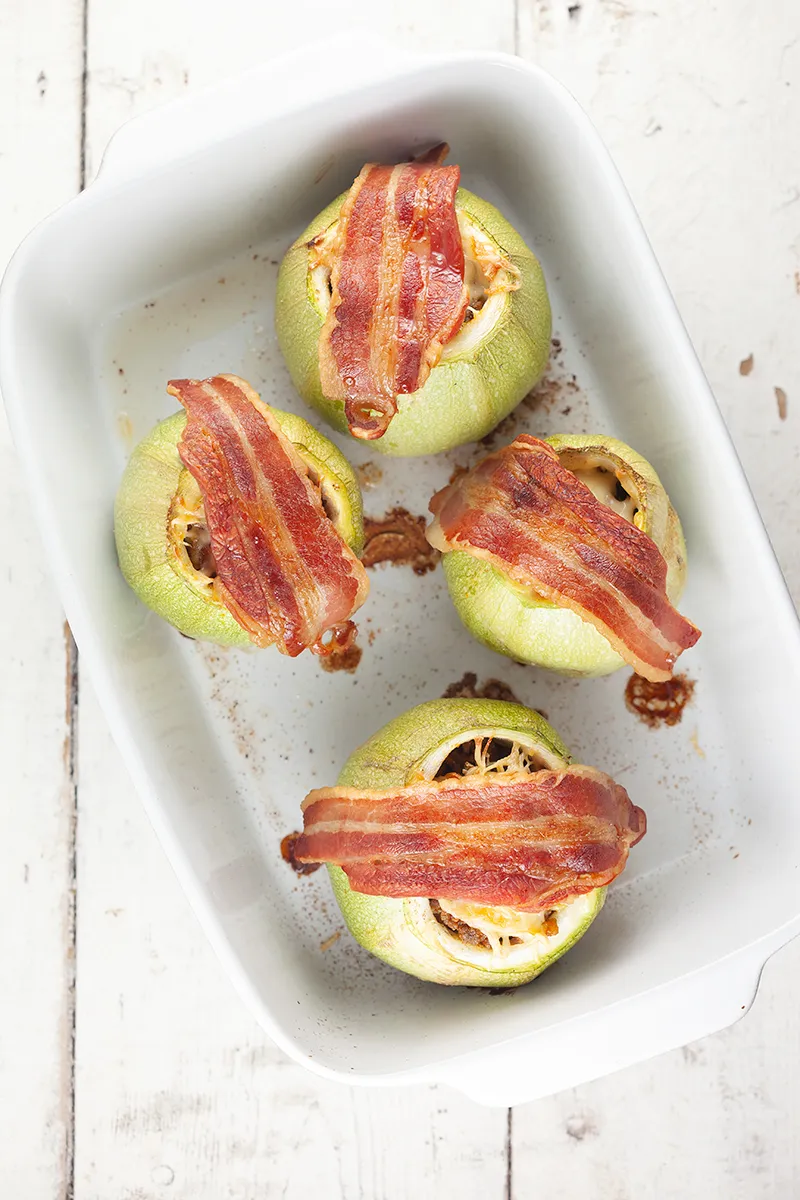 Beef stuffed zucchini with cheese and bacon