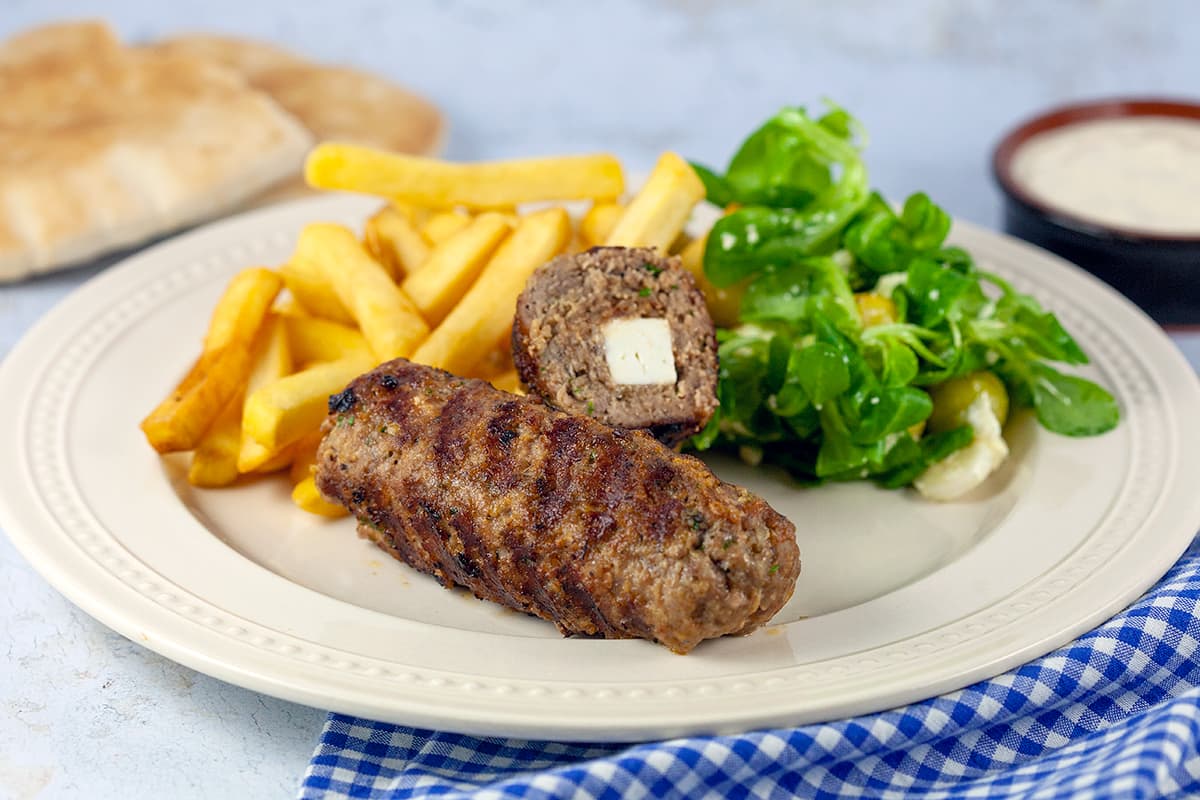 Bifteki (Greek burgers) with feta