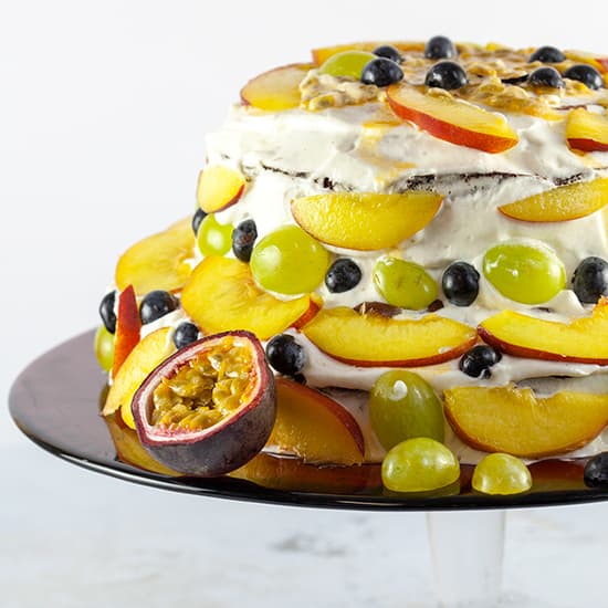 Fruit cake with whipped cream