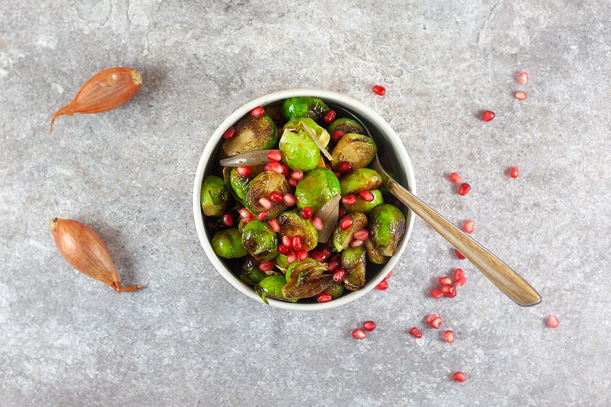 Pan-fried Brussels sprouts with pomegranate
