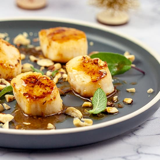 Scallops with hazelnuts and sage