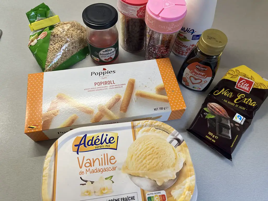 Chocolate and caramel ice cream sundae ingredients