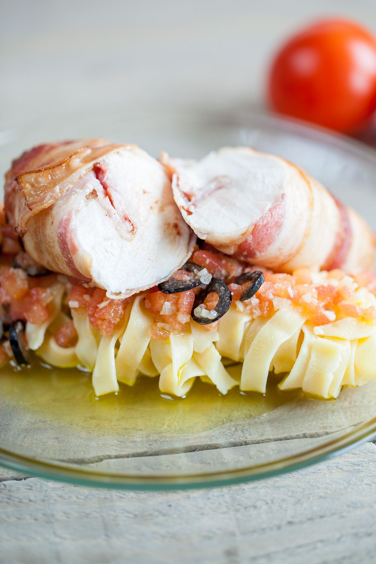 Home-made pasta with bacon wrapped chicken