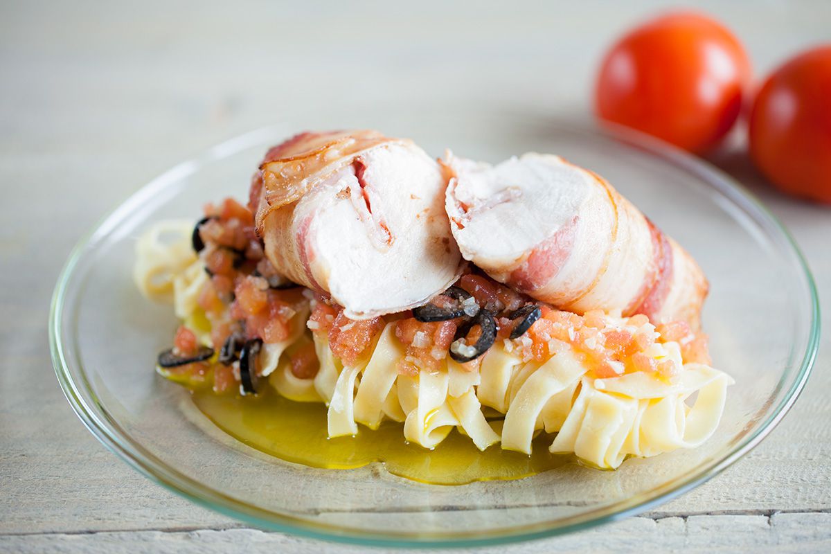 Home-made pasta with bacon wrapped chicken