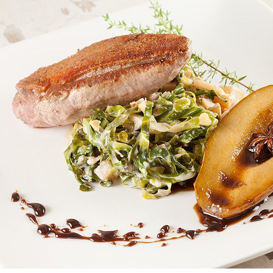 Pan-fried duck breast with creamed cabbage