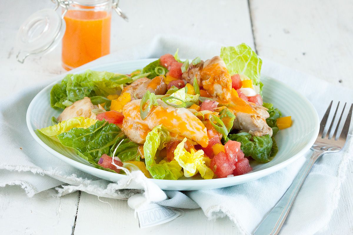 Salad with marinated chicken thighs and watermelon