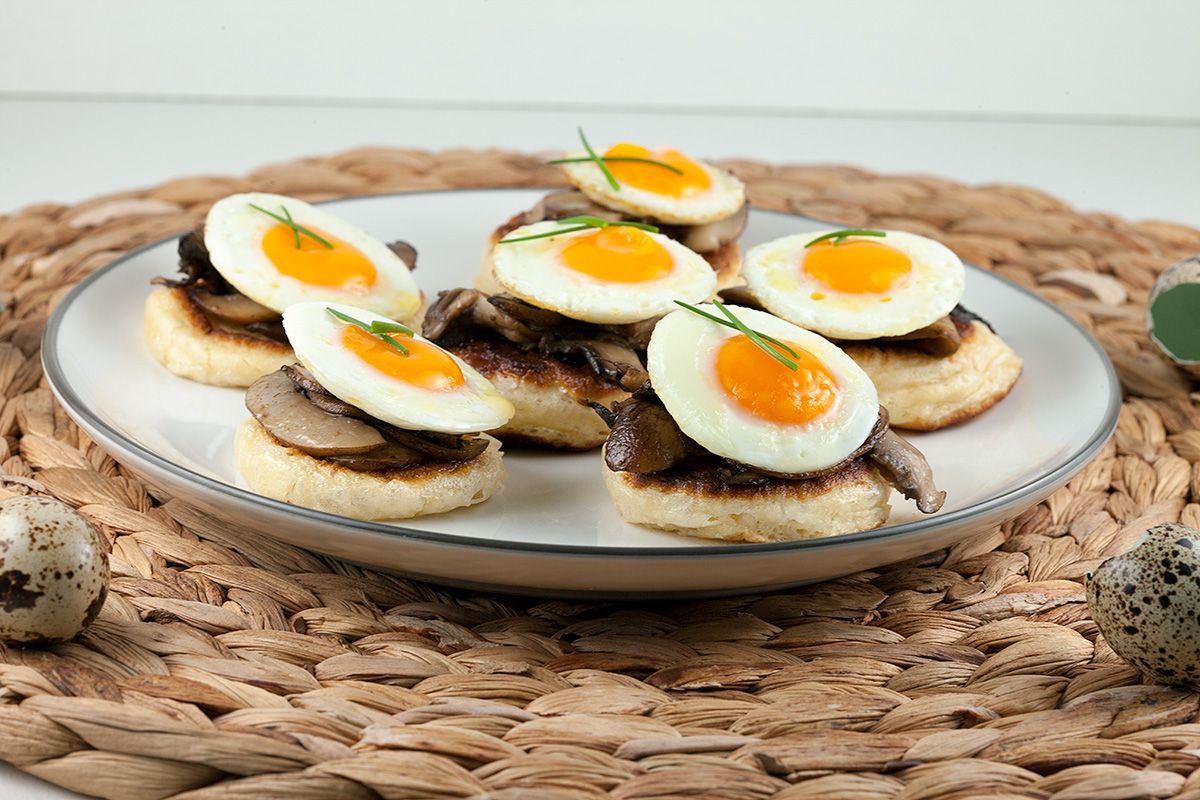 Blini's with chestnut mushrooms and quail eggs