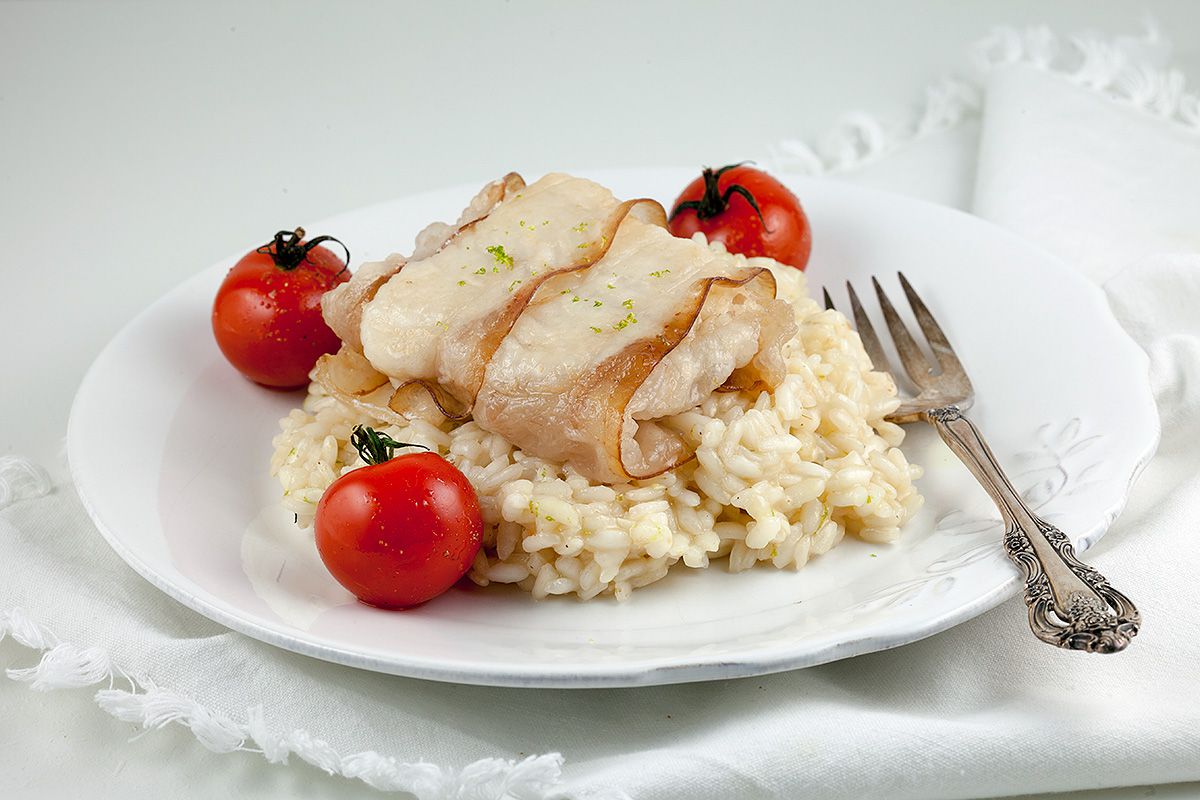 Bacon-wrapped cod with lime risotto