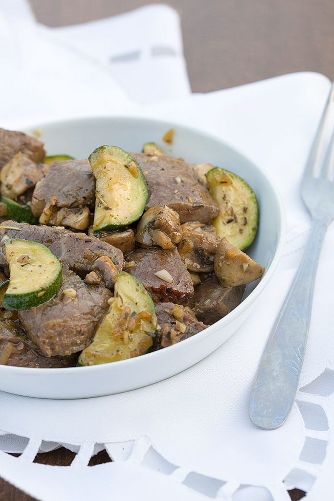 Marinated beef with zucchini and mushrooms