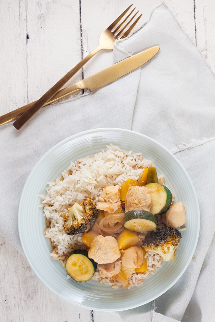 Sweet and sour chicken, vegetables and peaches