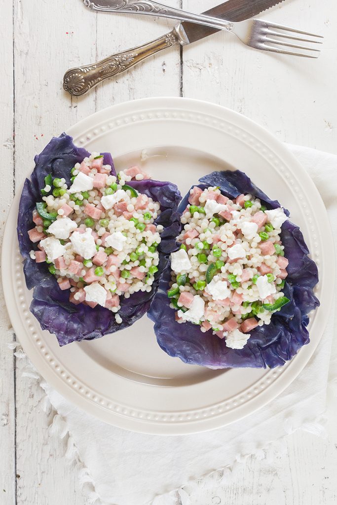 Red cabbage bowl with pearl couscous and goat's cheese