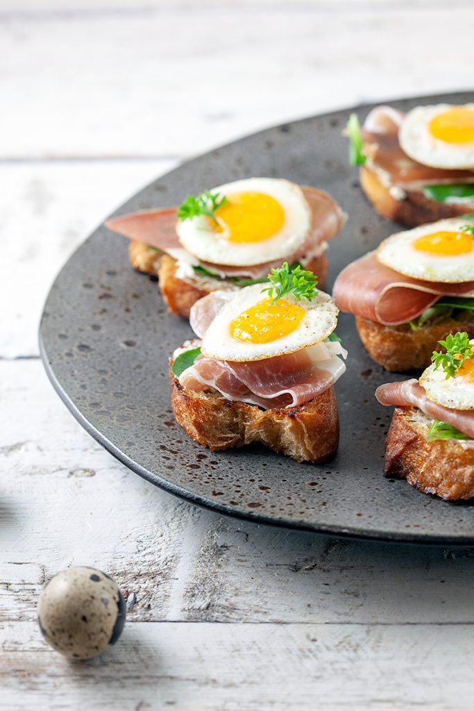 Ham and quail egg bruschetta