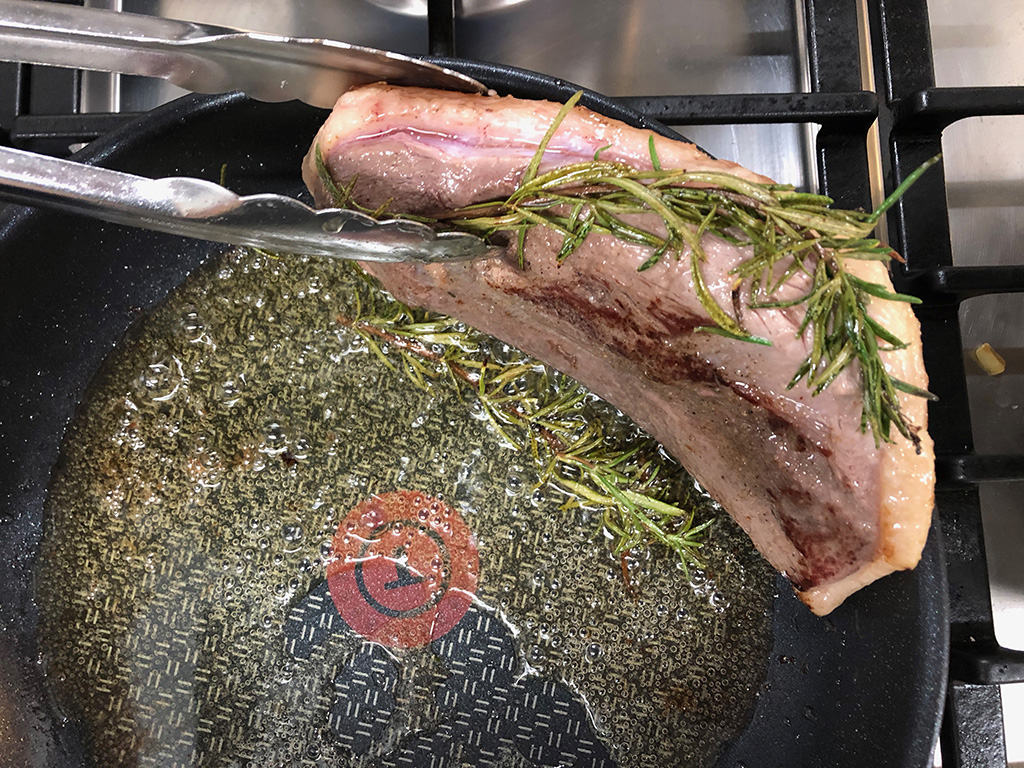 Searing the duck breast on both sides
