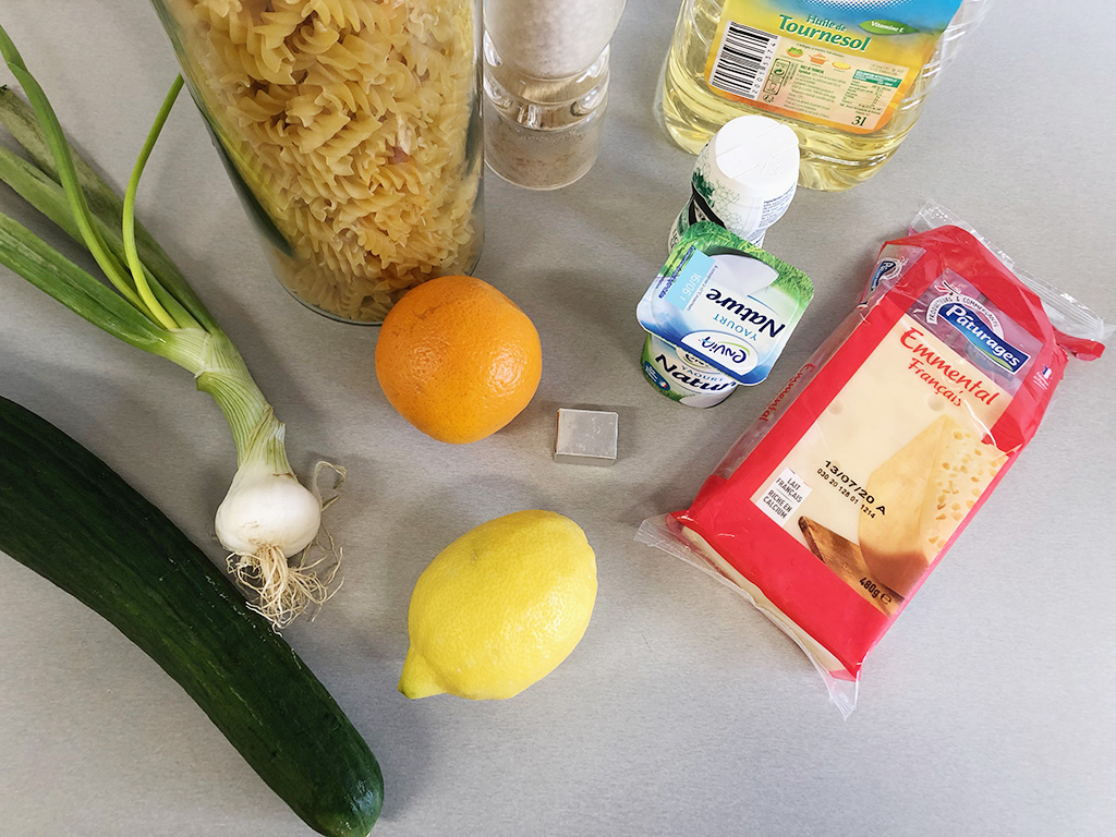 Pasta salad with orange and cheese ingredients