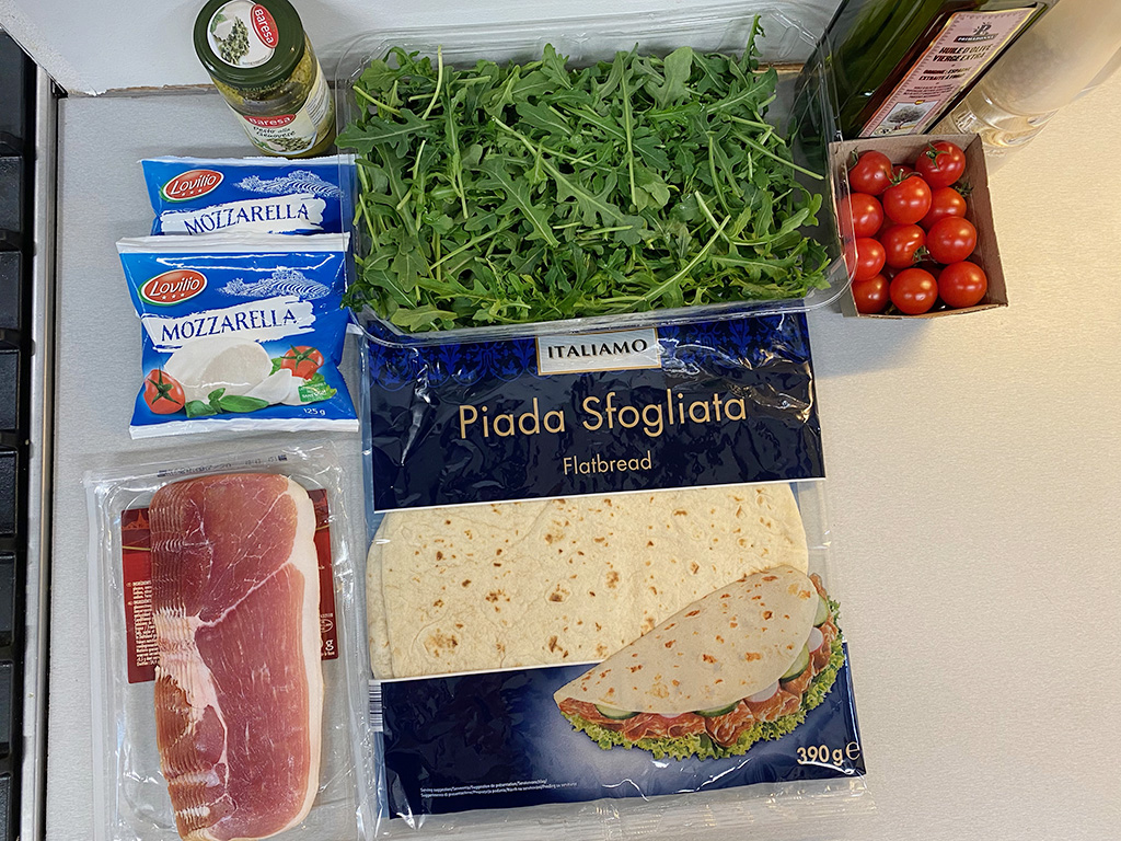Piadina with ham and mozzarella ingredients